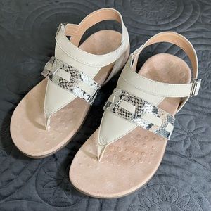 Vionic Lupe Metallic Snake Print Thong Sandal in “Cream Boa”